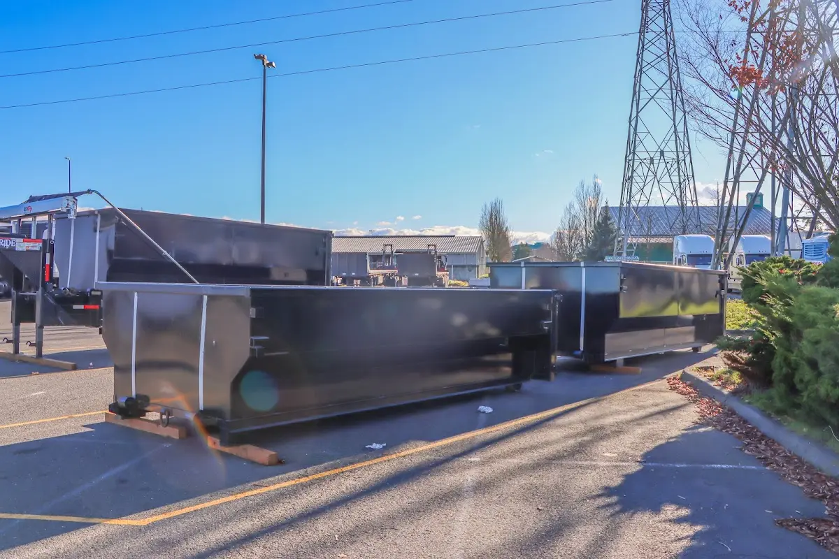 Roll-off dumpster ready for waste disposal at job site for Roofing Dumpster Rental in West Linn